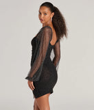 Flaunt your silhouette in the tight Shimmer Season Long Sleeve Glitter Mini Dress in black, a bodycon dress that empowers your look with bold style and effortless edge.