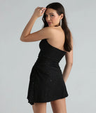 Revamp your 2025 wardrobe with this chic addition, the Living My Best Life Glitter Halter Mini Dress in black, perfect for elevating your style in the new year.