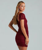 Unreal Shine Glitter Puff Sleeve Mini Dress in burgundy , a stylish red dress with a flattering fit and fabric that adds allure to your look, perfect for wedding guest attire, cocktail events, or making a bold statement on a date night.