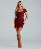 Revamp your 2025 wardrobe with this chic addition, the Unreal Shine Glitter Puff Sleeve Mini Dress in burgundy, perfect for elevating your style in the new year.