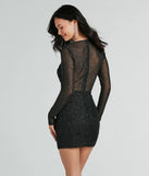 Revamp your 2025 wardrobe with this chic addition, the Glam Arrival Long Sleeve Sheer Glitter Mini Dress in black, perfect for elevating your style in the new year.