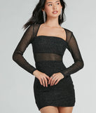 Step into winter chic with the Glam Arrival Long Sleeve Sheer Glitter Mini Dress, a raisin purple mini dress featuring an above-the-knee cut ideal for cocktail parties, festive gatherings, or clubwear.
