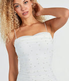 Make a bold statement in the So Much Class Faux Pearl Mini Dress in white, the perfect summer dress for weddings, cocktail hours, nights out, and/or seasonal celebrations.
