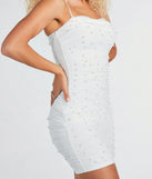 Step into seasonal chic with the So Much Class Faux Pearl Mini Dress, a white mini dress featuring an above-the-knee cut ideal for cocktail parties, festive gatherings, or clubwear.