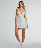 Step into winter chic with the Marvelous Darling Lace-Up Floral Chiffon Dress, a ivory mini dress featuring an above-the-knee cut ideal for cocktail parties, festive gatherings, or clubwear.