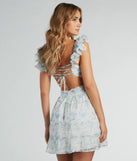 The Marvelous Darling Lace-Up Floral Chiffon Dress is a stylish ivory floral dress featuring a fresh seasonal print and flattering design, perfect for garden parties, bridal showers, Valentine's Day celebrations, or everyday spring styling.