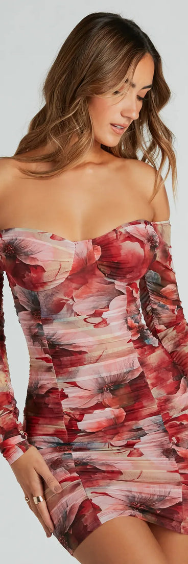 The Bold Bloom Off-The-Shoulder Floral Mesh Mini Dress is a mini dress that will make a statement with its short hemline and on-trend details to have you ready for any event!