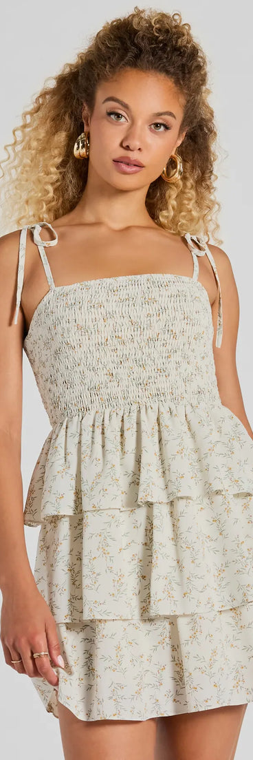 The Cascading Romance Ruffle Floral Skater Dress is a mini dress that will make a statement with its short hemline and on-trend details to have you ready for any event!