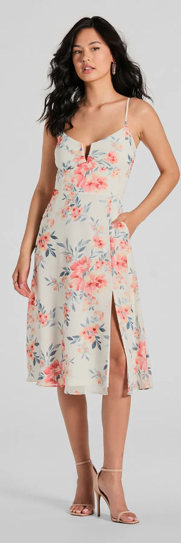 Essential for vacations or summer days, the Floral Energy Sleeveless A-Line Chiffon Midi Dress is a sundress or milkmaid dress with sleek and flirty details.
