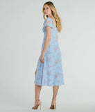 Make a bold statement in the Forever Beauty Puff Sleeve Floral Chiffon Midi Dress in light blue, the perfect spring dress for weddings, cocktail hours, nights out, and/or seasonal celebrations.