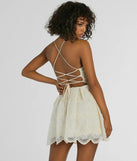The Regal Chic Lace Up Tulle Embroidered Skater Dress is a mini dress that will make a statement with its short hemline and on-trend details to have you ready for any event!