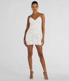 The Major Swoon Strappy Back Lace Mini Dress is a white dress, an essential holiday or NYE dress that pairs chic style with versatility making it perfect for cocktail events, New Year's Eve parties, or as a winter wedding guest look.