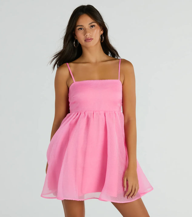 The Babe Of The Hour Sleeveless Bow Back Babydoll Dress is a mini dress that will make a statement with its short hemline and on-trend details to have you ready for any event!