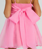The Babe Of The Hour Sleeveless Bow Back Babydoll Dress is a mini dress that will make a statement with its short hemline and on-trend details to have you ready for any event!