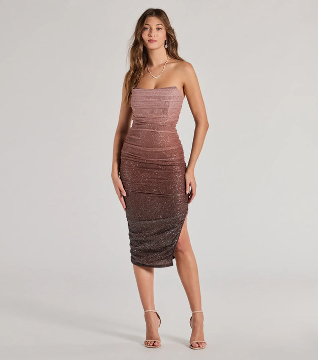 With its mid-calf hem and popular flattering fit, the Effortless Dazzle Ombre Glitter Mesh Midi Dress in brown nails the balance of trend and ease, redefining go-to midi dresses for any occasion.
