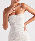 The Picture-Perfect Glitter Lace Short Dress is a stylish white lace dress, designed with intricate lace and an alluring silhouette, making it an elegant choice for graduation photoshoots, weddings, or effortless spring looks.