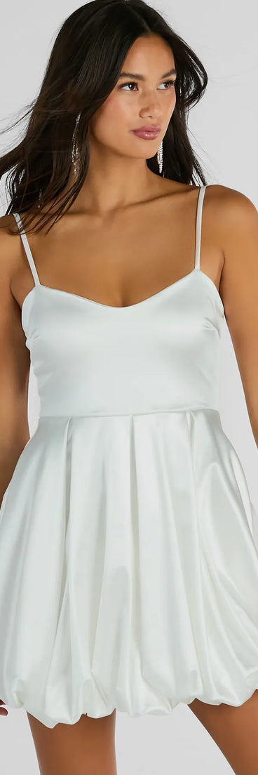 The Lavish Flirt V-Neck Bubble Hem Skater Satin Dress is a mini dress that will make a statement with its short hemline and on-trend details to have you ready for any event!