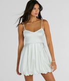The Lavish Flirt V-Neck Bubble Hem Skater Satin Dress is a mini dress that will make a statement with its short hemline and on-trend details to have you ready for any event!