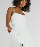 Step into winter chic with the Whimsical Beauty Strappy Back Textured Knit Skater Dress, a white mini dress featuring an above-the-knee cut ideal for cocktail parties, festive gatherings, or clubwear.