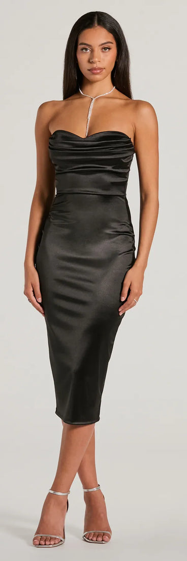 Keep it classic with the Exquisite In Strapless Satin Midi Dress, a feed-worthy pick from Windsor's black homecoming dress collection made to stop their scroll from pictures to the dance floor.