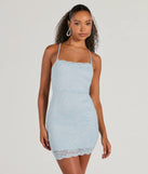 Step into winter chic with the Modern Love Lace-Up Lace Glitter Mini Dress, a light blue mini dress featuring an above-the-knee cut ideal for cocktail parties, festive gatherings, or clubwear.