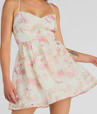 Step into winter chic with the Floral Day Dream Lace Up Eyelet Skater Dress, a ivory mini dress featuring an above-the-knee cut ideal for cocktail parties, festive gatherings, or clubwear.