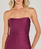 Make a bold statement in the Sultry Drama Strapless Asymmetric Knit Midi Dress in berry, the perfect spring dress for weddings, cocktail hours, nights out, and/or seasonal celebrations.