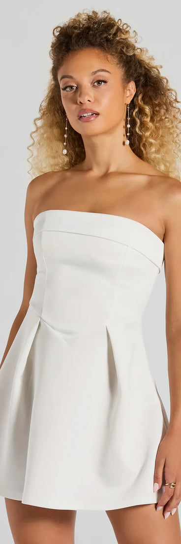 Step into seasonal chic with the Sweet And Sassy Strapless Scuba Knit Skater Dress, a white mini dress featuring an above-the-knee cut ideal for cocktail parties, festive gatherings, or clubwear.