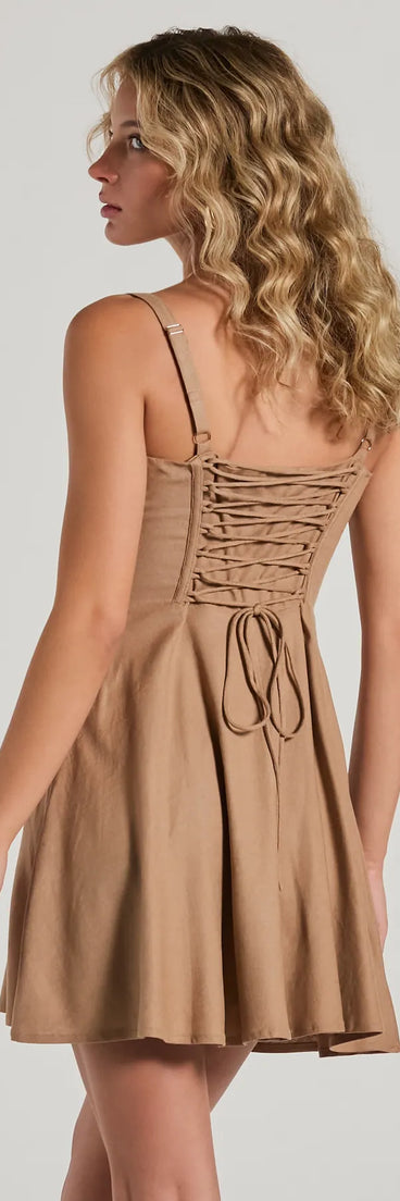 The Bold New Look Corset Lace-Up Linen Skater Dress is a mini dress in natural, perfect for a graduation party dress or a stylish date look, with a short hemline designed to make a statement.