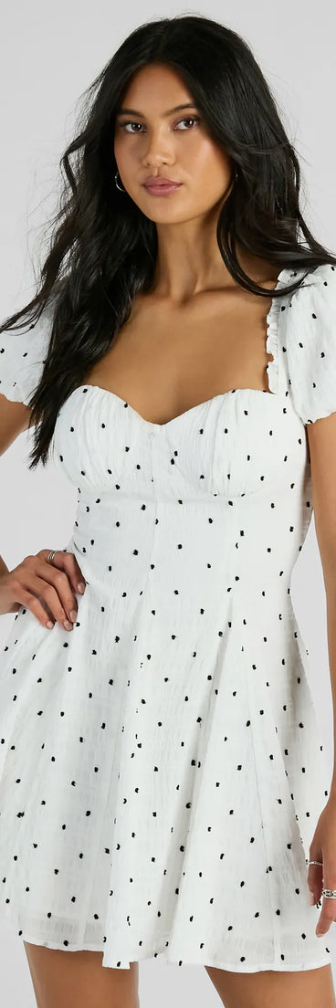 Essential for vacations or summer days, the Charmed And Cute Polka Dot Chiffon Skater Dress is a sundress or milkmaid dress with sleek and flirty details.