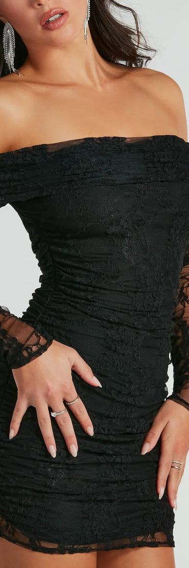 Step into winter chic with the Keep The Spark Off-The-Shoulder Lace Mini Dress, a black mini dress featuring an above-the-knee cut ideal for cocktail parties, festive gatherings, or clubwear.
