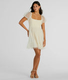 The Raise A Toast Puff Sleeve Faux Pearl Babydoll Dress is a mini dress that will make a statement with its short hemline and on-trend details to have you ready for any event!