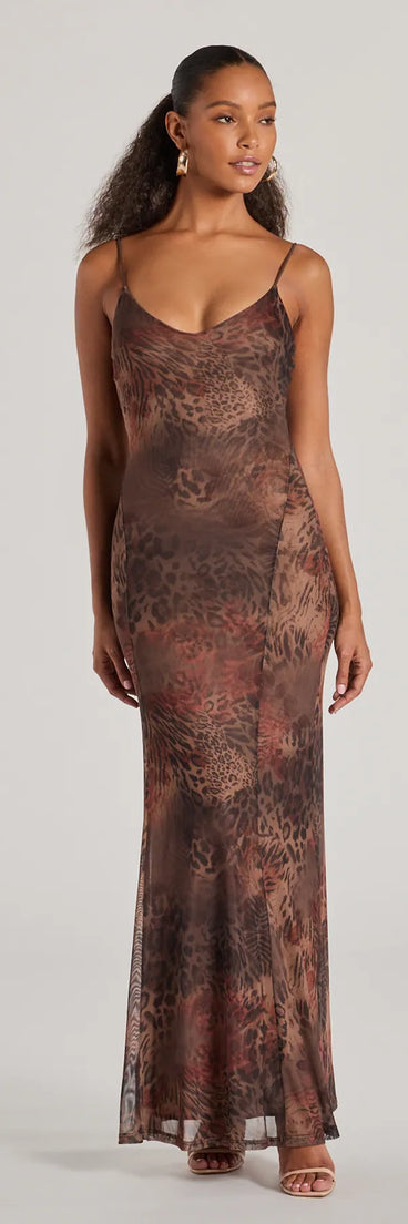 Revamp your 2025 wardrobe with this chic addition, the Fierce Allure Leopard Print Mesh Maxi Dress in leopard print, perfect for elevating your style in the new year.