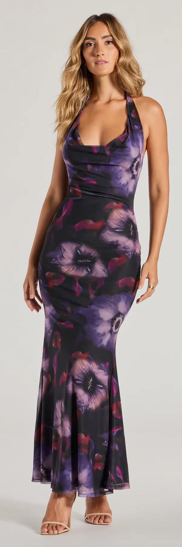 The stunning Sultry Fave Halter Cowl Neck Floral Maxi Dress provides a chic silhouette and party-ready details that make it a standout black dress for cocktail events, New Year's Eve parties, or as a winter wedding guest look.