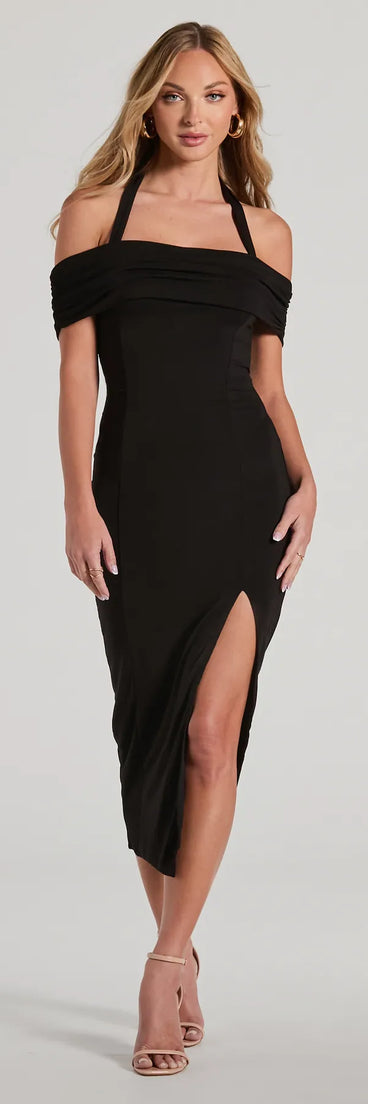 With its mid-calf hem and popular flattering fit, the Dial F For Flirty Off-The-Shoulder Halter Midi Dress in black nails the balance of trend and ease, redefining go-to midi dresses for any occasion.