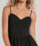 Step into winter chic with the Win Hearts Sweetheart Woven Short Skater Dress, a black mini dress featuring an above-the-knee cut ideal for cocktail parties, festive gatherings, or clubwear.