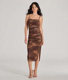 Elevate your winter wardrobe with the Artsy Charm Corset Abstract Bodycon Midi Dress— a party-ready brown cocktail dress featuring seasonal accents and a sophisticated style, ideal for semi-formal holiday events from family dinners to NYE celebrations.