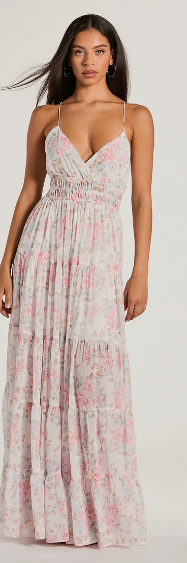 Essential for vacations or summer days, the Exceptional Bliss Lace-Up Floral Chiffon Maxi Dress is a sundress or milkmaid dress with sleek and flirty details.