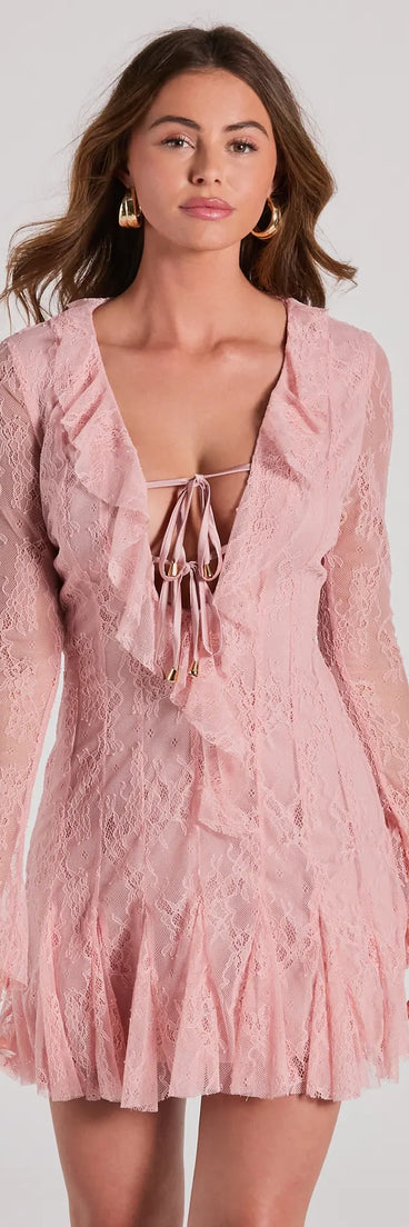 Step into winter chic with the Dreamy Mix Long Sleeve Ruffle Lace A-Line Dress, a pink mini dress featuring an above-the-knee cut ideal for cocktail parties, festive gatherings, or clubwear.