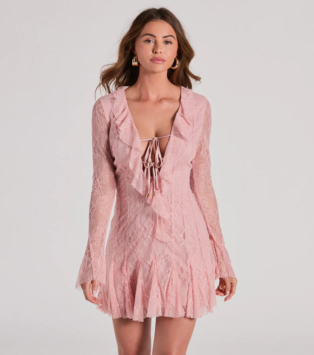 Step into winter chic with the Dreamy Mix Long Sleeve Ruffle Lace A-Line Dress, a pink mini dress featuring an above-the-knee cut ideal for cocktail parties, festive gatherings, or clubwear.