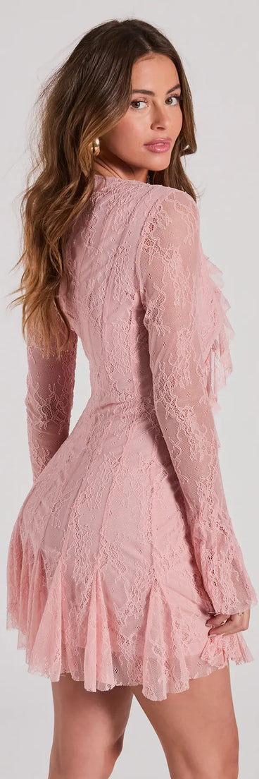 The Dreamy Mix Long Sleeve Ruffle Lace A-Line Dress is a mini dress in pink, perfect for an above-the-knee holiday party dress or a stylish NYE look, with a short hemline designed to make a winter statement.