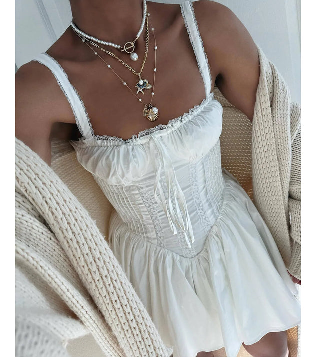 Make a bold statement in the So Darling Woven Drop-Waist Skater Dress in white, the perfect spring dress for weddings, cocktail hours, nights out, and/or seasonal celebrations.