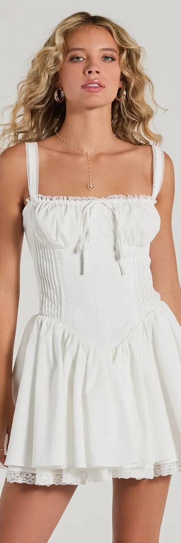 Step into seasonal chic with the So Darling Woven Drop-Waist Skater Dress, a white mini dress featuring an above-the-knee cut ideal for cocktail parties, festive gatherings, or clubwear.