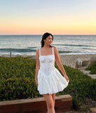 The So Darling Woven Drop-Waist Skater Dress is a stylish white lace dress, designed with intricate lace and an alluring silhouette, making it an elegant choice for graduation photoshoots, weddings, or effortless spring looks.