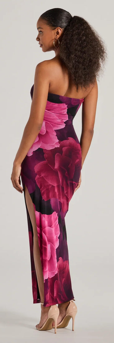 The Grandeur Blooms Strapless Slit Floral Maxi Dress is a stylish black floral dress featuring a fresh seasonal print and flattering design, perfect for garden parties, bridal showers, graduation photoshoots, or everyday summer styling.