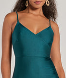 Make a bold statement in the Spotlight Moment V-Neck Surplice Midi Dress in hunter green, the perfect green dress for weddings, cocktail hours, nights out, and/or seasonal celebrations.