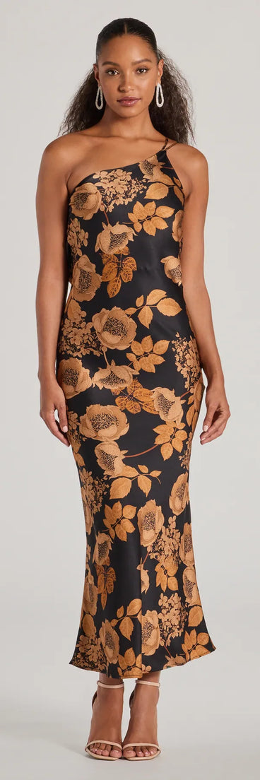 Revamp your 2025 wardrobe with this chic addition, the Sensational Sultry One-Shoulder Floral Satin Maxi Dress in black, perfect for elevating your style in the new year.
