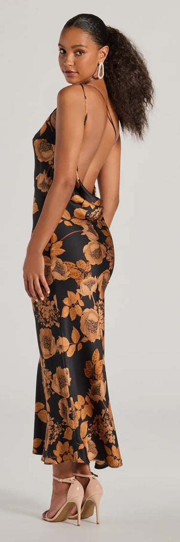 Revamp your 2025 wardrobe with this chic addition, the Sensational Sultry One-Shoulder Floral Satin Maxi Dress in black, perfect for elevating your style in the new year.
