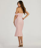 The Exceptional Off-The-Shoulder Flared Midi Dress is a pink midi dress, featuring an elevated midi-length silhouette perfect for wedding guest attire, romantic date nights, or effortless everyday styling.