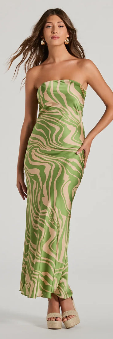 The Fierce Stripes Strapless Zebra Print Satin Maxi Dress is a natural dress, an essential holiday or NYE dress that pairs chic style with versatility making it perfect for cocktail events, New Year's Eve parties, or as a winter wedding guest look.